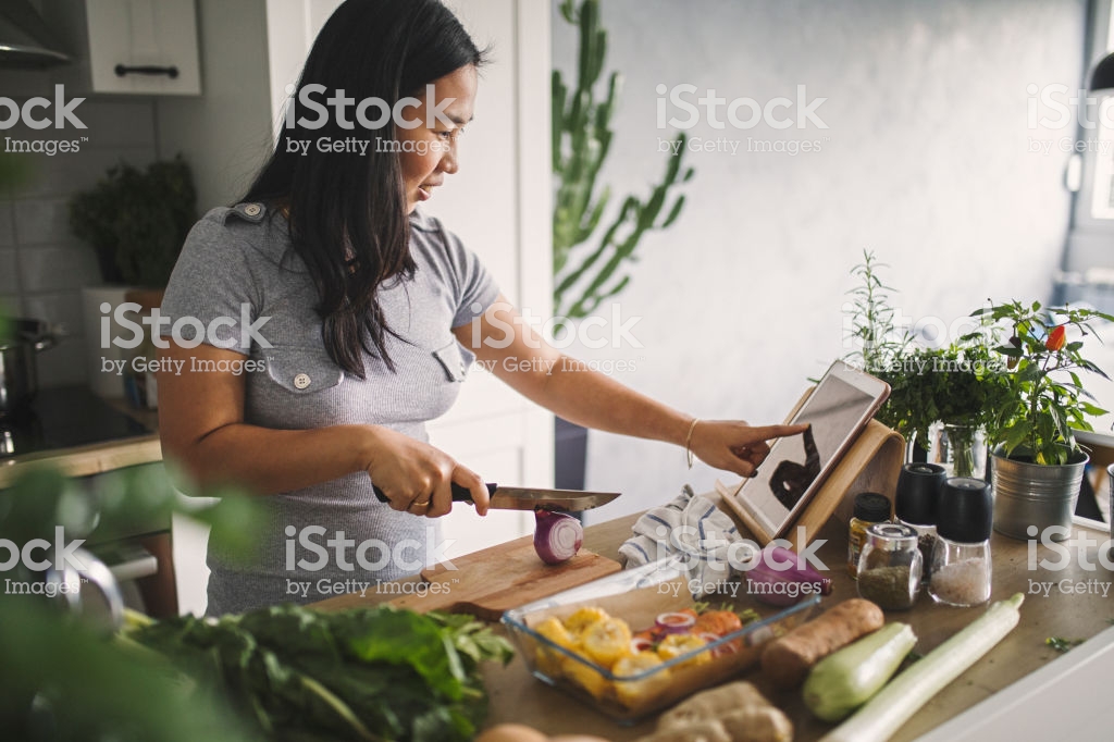 Woman cooking healthy meal